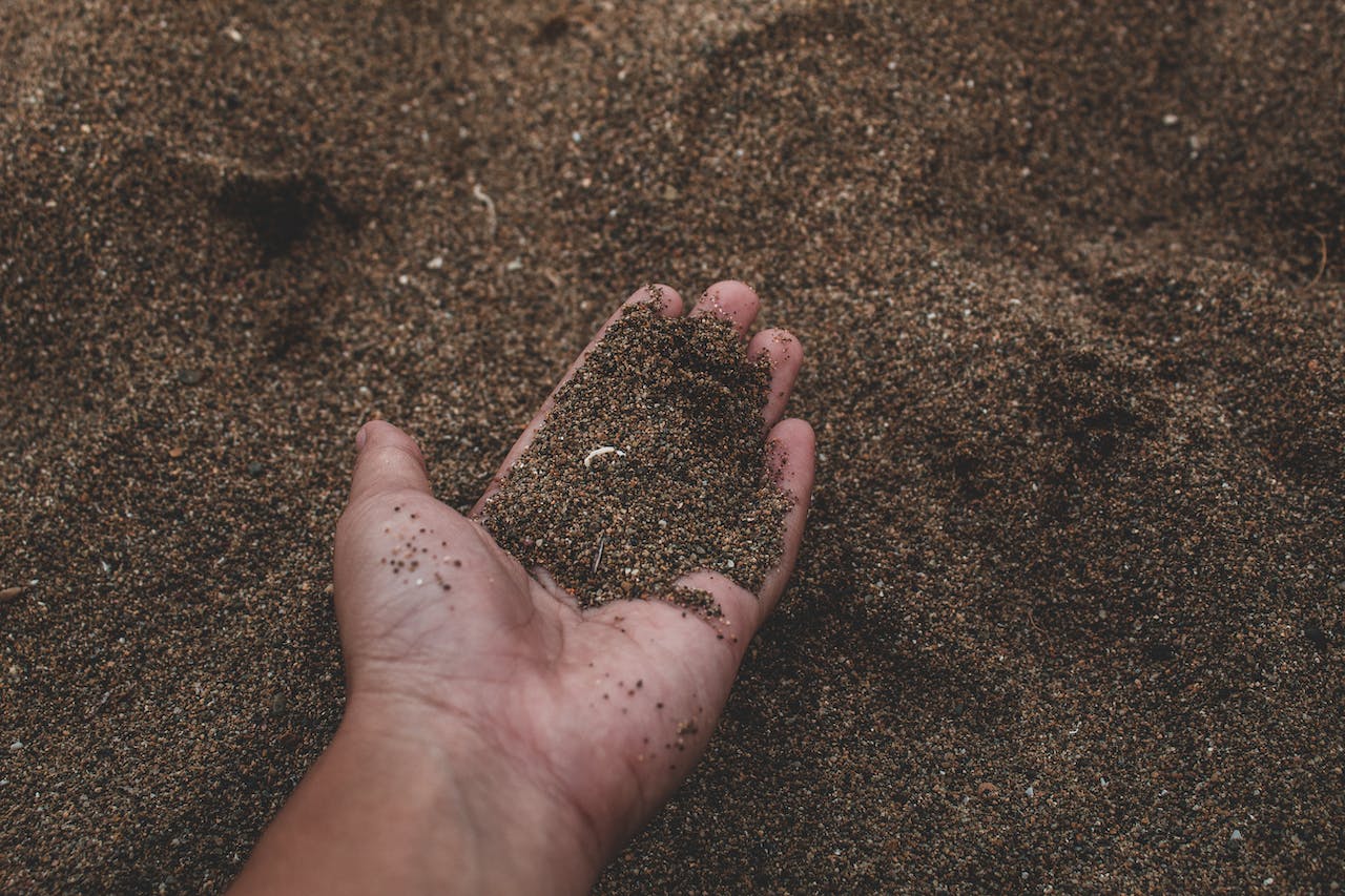 hand holding sand